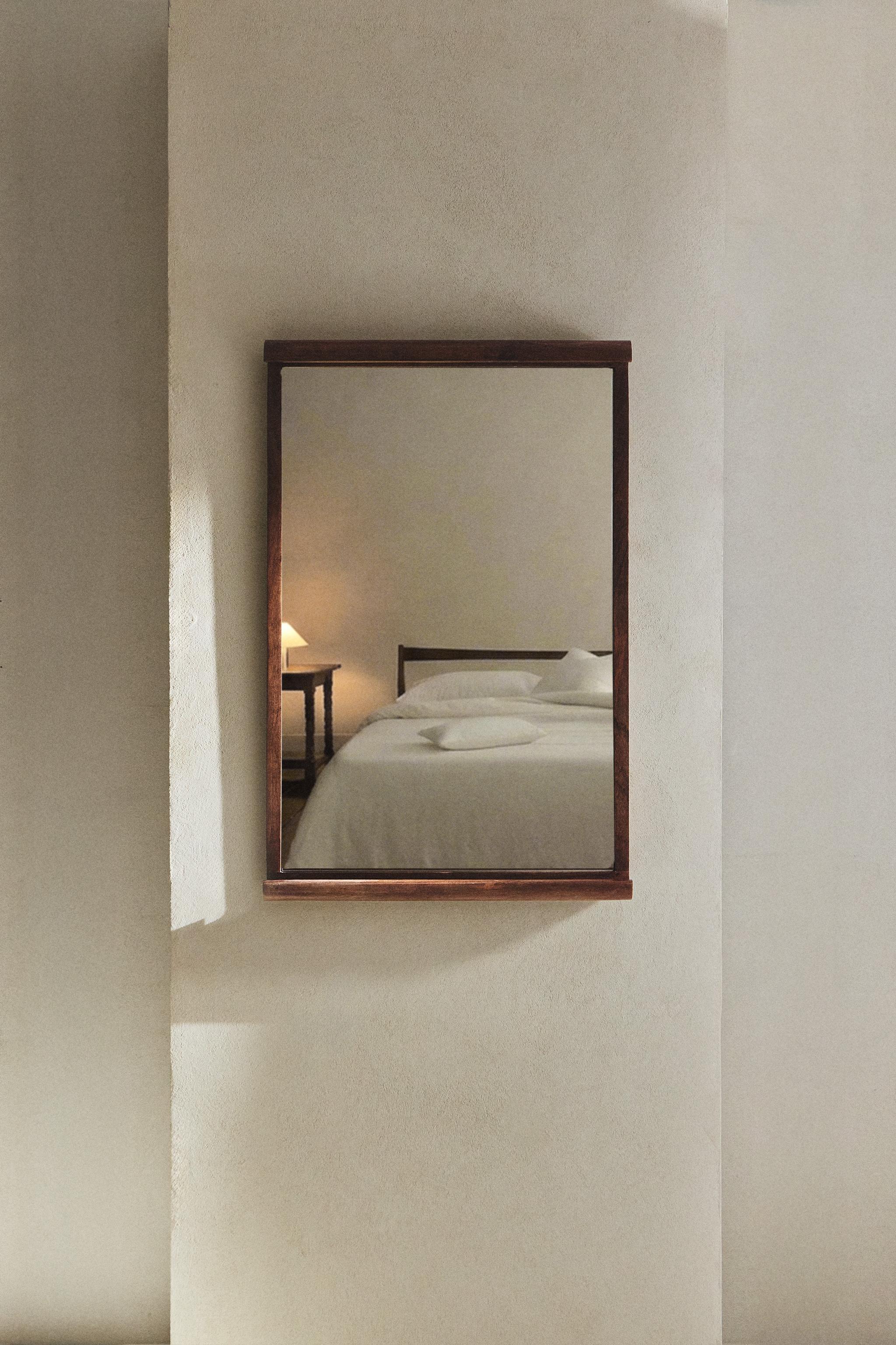 MIROIR MURAL CADRE COURBÉ